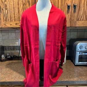 Woman Within Vibrant Red Cardigan